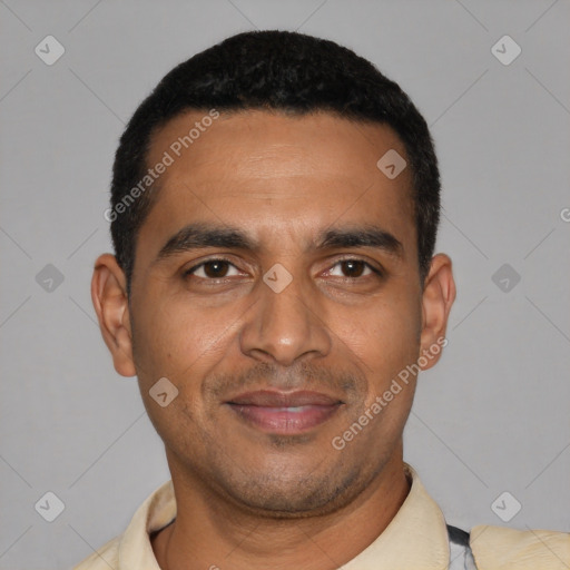 Joyful latino young-adult male with short  black hair and brown eyes