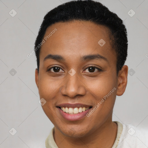 Joyful latino young-adult female with short  brown hair and brown eyes