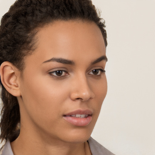 Neutral latino young-adult female with short  brown hair and brown eyes