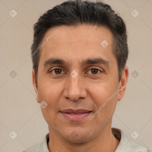 Joyful white adult male with short  brown hair and brown eyes