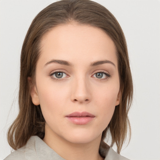 Neutral white young-adult female with medium  brown hair and grey eyes