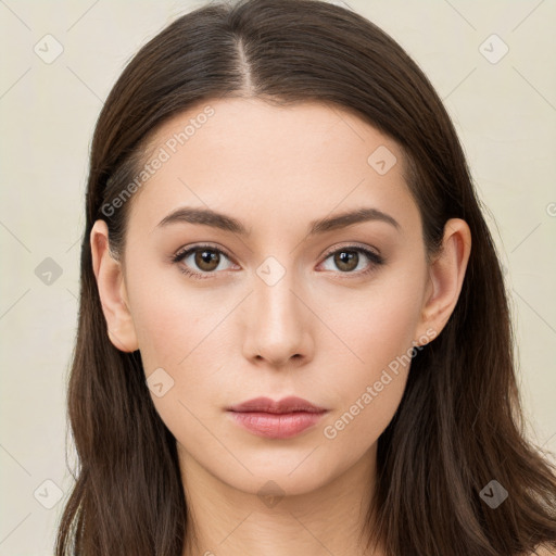 Neutral white young-adult female with long  brown hair and brown eyes