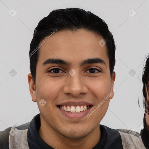 Joyful latino young-adult male with short  black hair and brown eyes