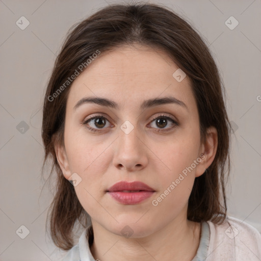 Neutral white young-adult female with medium  brown hair and brown eyes