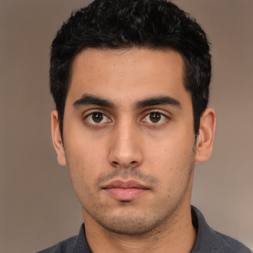 Neutral latino young-adult male with short  black hair and brown eyes