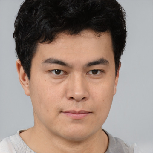 Neutral asian young-adult male with short  brown hair and brown eyes