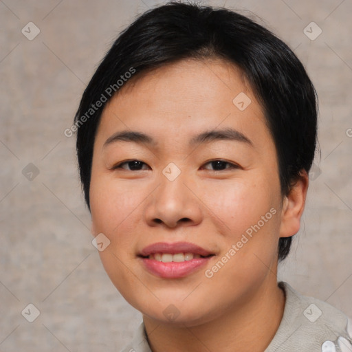 Joyful asian young-adult female with short  brown hair and brown eyes