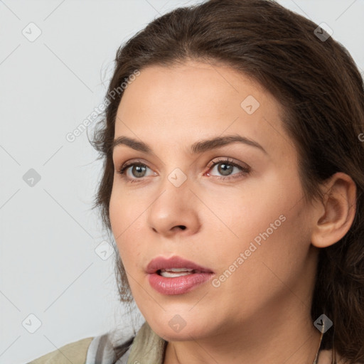 Neutral white young-adult female with medium  brown hair and brown eyes