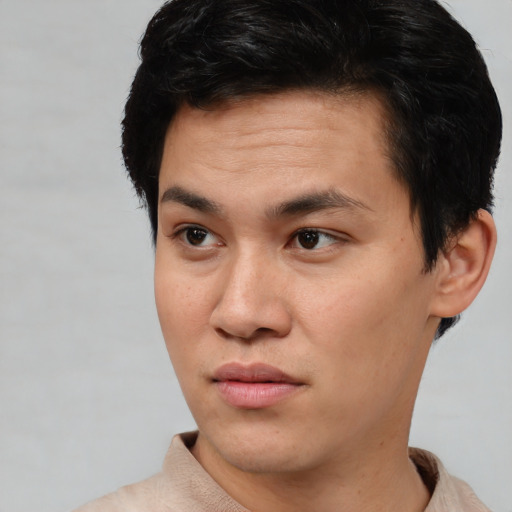 Neutral asian young-adult male with short  black hair and brown eyes