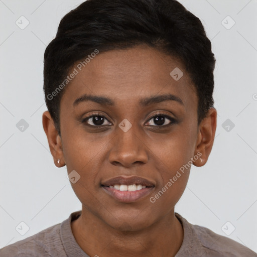 Joyful black young-adult female with short  black hair and brown eyes