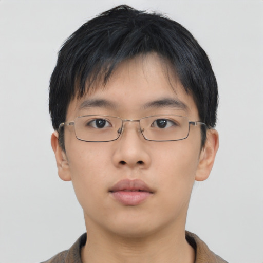 Neutral asian young-adult male with short  brown hair and brown eyes