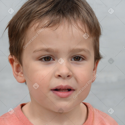 Joyful white child male with short  brown hair and brown eyes