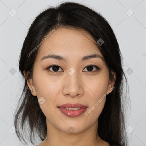 Joyful asian young-adult female with medium  brown hair and brown eyes