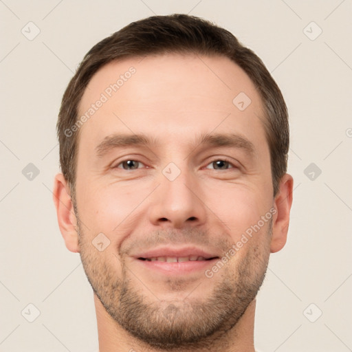 Joyful white adult male with short  brown hair and brown eyes