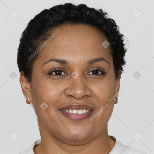 Joyful black adult female with short  brown hair and brown eyes