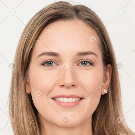 Joyful white young-adult female with long  brown hair and grey eyes