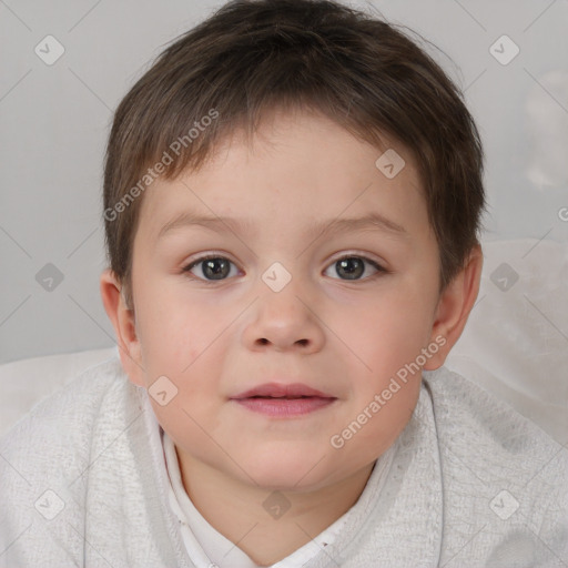 Joyful white child male with short  brown hair and brown eyes