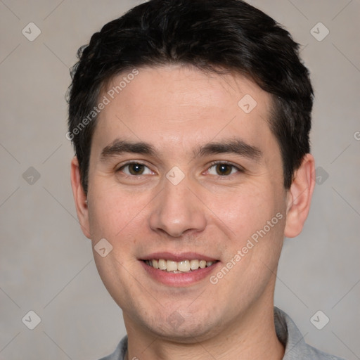 Joyful white young-adult male with short  black hair and brown eyes