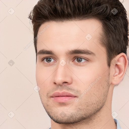 Neutral white young-adult male with short  brown hair and brown eyes