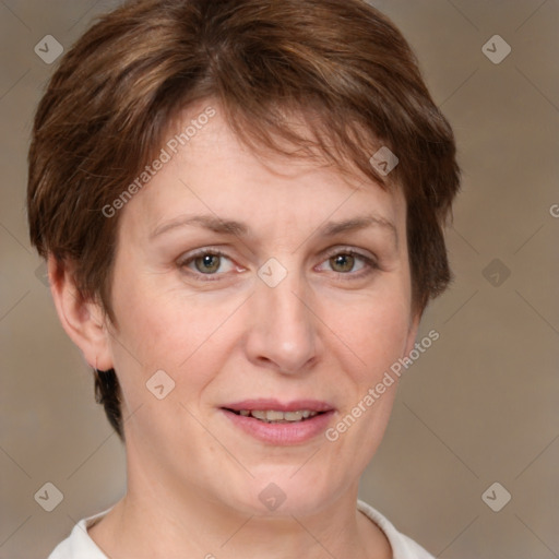 Joyful white adult female with short  brown hair and brown eyes