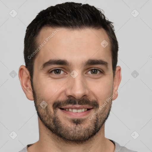 Joyful white young-adult male with short  brown hair and brown eyes