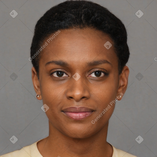 Joyful black young-adult female with short  black hair and brown eyes