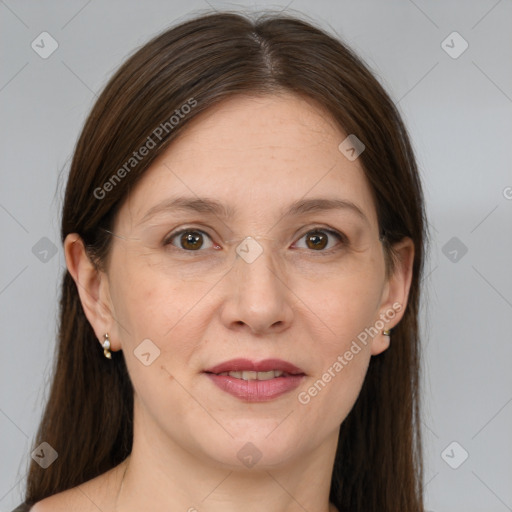 Joyful white adult female with medium  brown hair and brown eyes