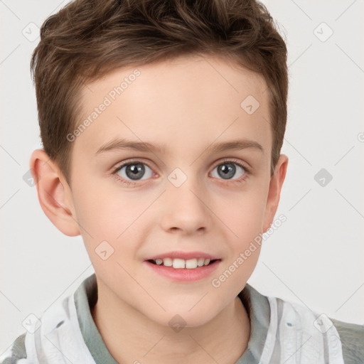 Joyful white child male with short  brown hair and grey eyes