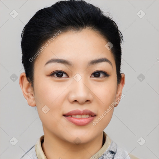 Joyful asian young-adult female with short  black hair and brown eyes