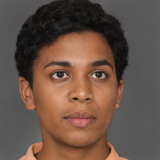 Neutral black young-adult male with short  brown hair and brown eyes