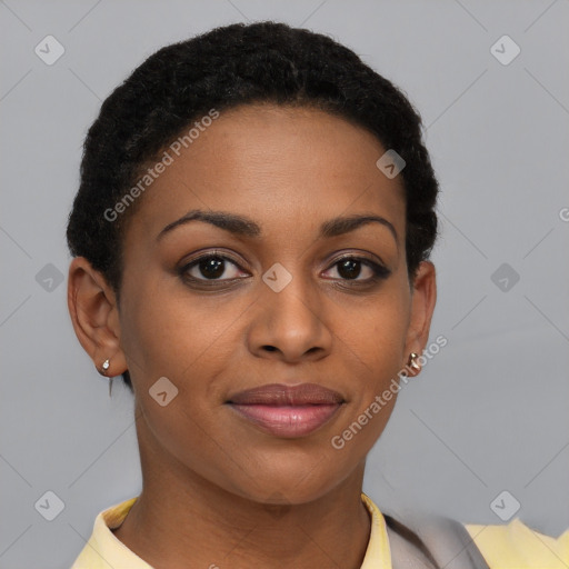 Joyful black young-adult female with short  brown hair and brown eyes