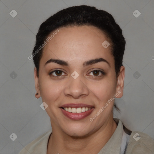 Joyful latino young-adult female with short  black hair and brown eyes