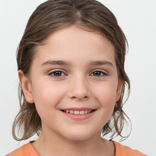 Joyful white child female with medium  brown hair and brown eyes