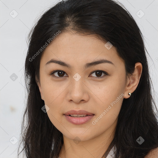 Joyful asian young-adult female with long  brown hair and brown eyes