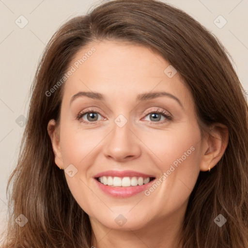 Joyful white young-adult female with long  brown hair and grey eyes