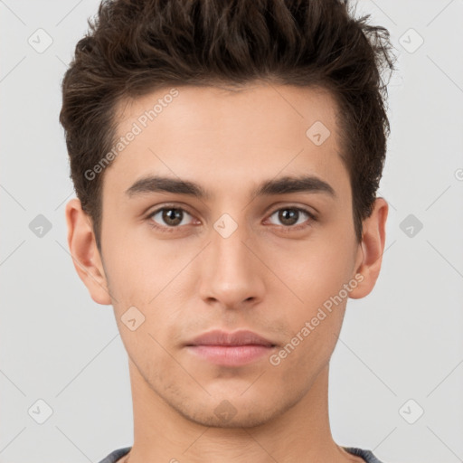 Neutral white young-adult male with short  brown hair and brown eyes