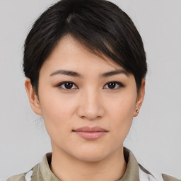 Neutral asian young-adult female with medium  brown hair and brown eyes