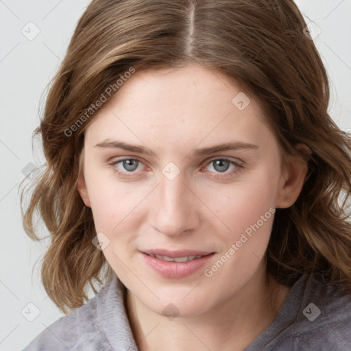 Joyful white young-adult female with medium  brown hair and blue eyes