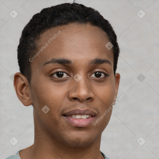 Joyful black young-adult male with short  black hair and brown eyes