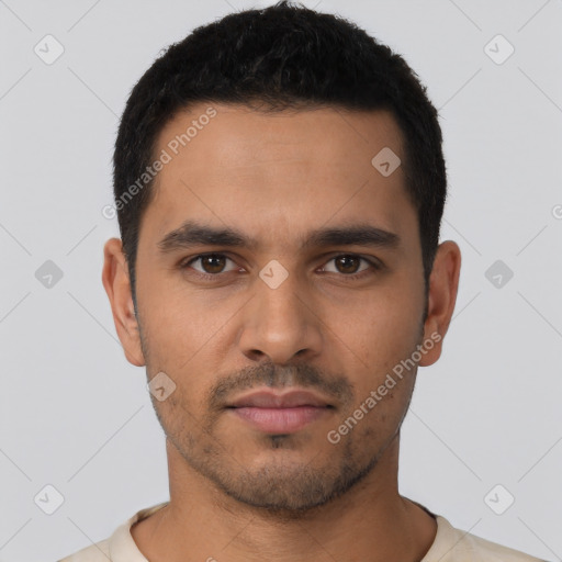 Neutral latino young-adult male with short  black hair and brown eyes