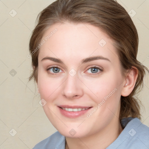 Joyful white young-adult female with medium  brown hair and blue eyes