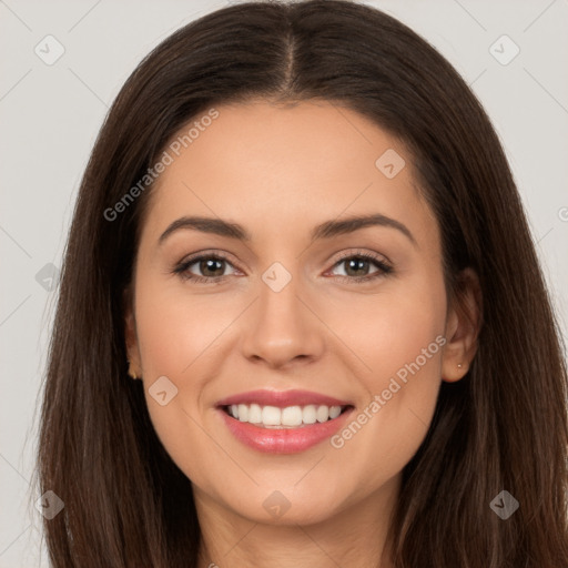 Joyful white young-adult female with long  brown hair and brown eyes