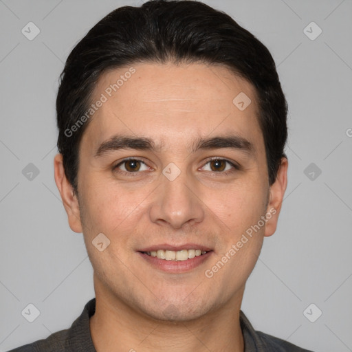 Joyful white young-adult male with short  black hair and brown eyes