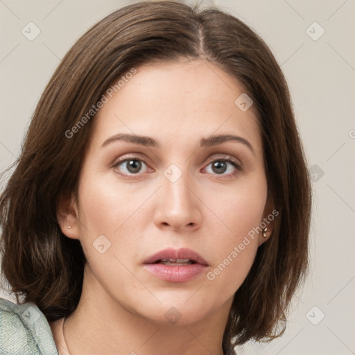 Neutral white young-adult female with medium  brown hair and grey eyes