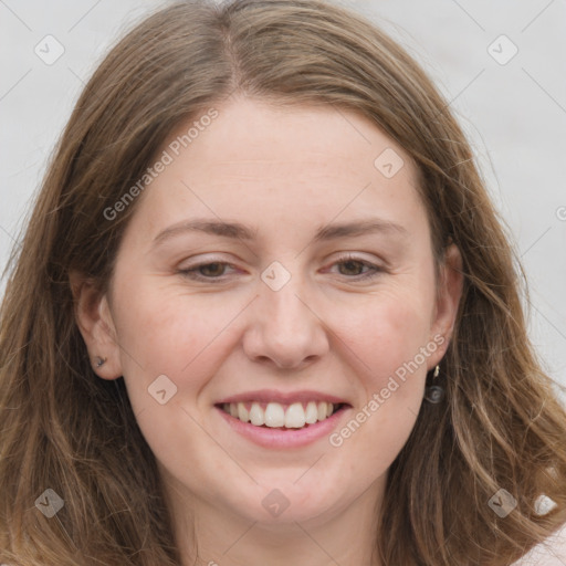 Joyful white young-adult female with long  brown hair and grey eyes