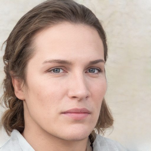 Neutral white young-adult female with medium  brown hair and grey eyes