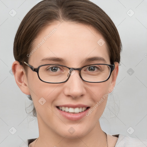 Joyful white young-adult female with medium  brown hair and grey eyes