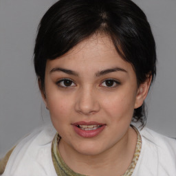 Joyful white young-adult female with medium  brown hair and brown eyes