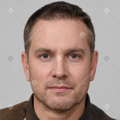 Neutral white adult male with short  brown hair and brown eyes