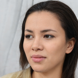 Joyful asian young-adult female with long  brown hair and brown eyes